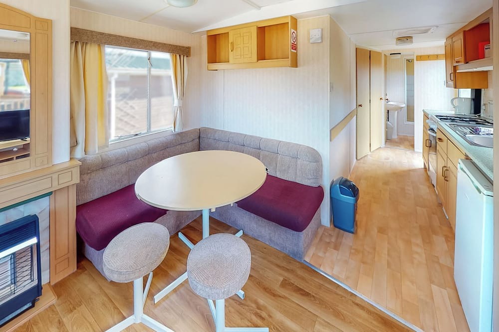 Llanllwchaiarn House | Comfortable caravan with one double and two twin.