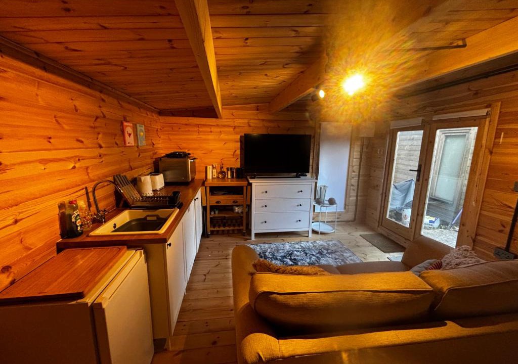 Mortimer West End Apartment | Log Cabin