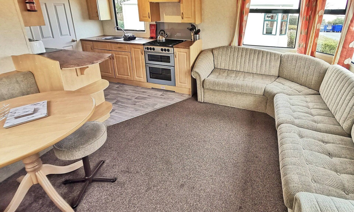 Aberystwyth House | Spacious 12ft-wide caravan with one double and one twin.