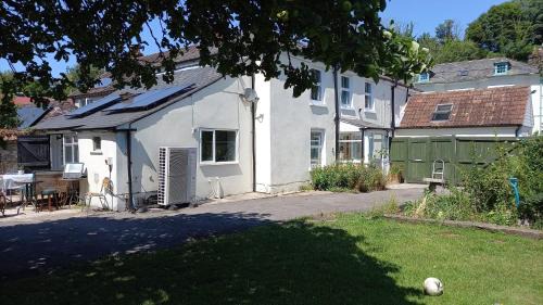 Dorchester House | The Post Office, 6 beds, Bar, Library, Pool Table, Stream, Large Garden