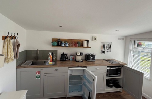 Saint Ann's Chapel Cabin | 1 Bed Cabin-Sleeps 2, Hot Tub, Garden, Pets, Views