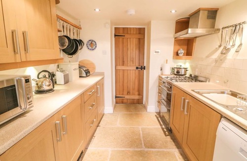 Ingleton Cottage | 2 STORRS COTTAGES, south-facing patio, in Ingleton