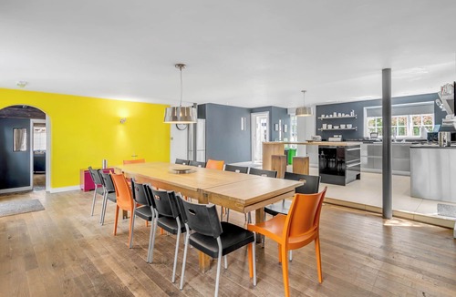 Stoke Ferry House | 7 Storey Listed Windmill, dog friendly with outdoor pool & bbq