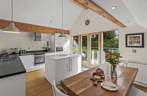 Talland House | Beautiful holiday home with hot tub, just a walk away from Talland beach.