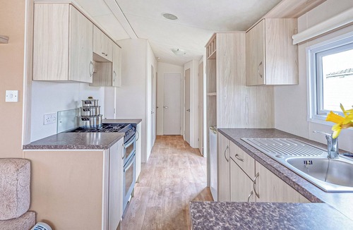 Prestatyn House | Caravan with one double and two twin.