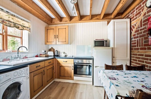 Martin Cottage | Charming thatched countryside hideaway with beams and garden access