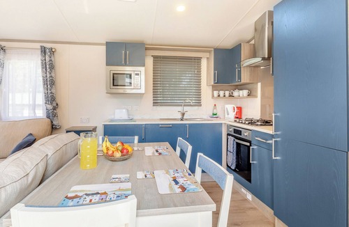 Axminster Apartment | Comfortable and modern 12ft-wide caravan with one double and one twin bedroom.