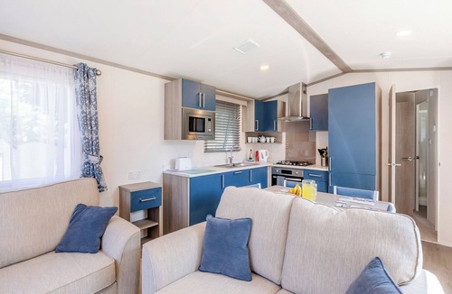 Axminster Apartment | Comfortable and modern 12ft-wide caravan with one double and one twin bedroom.
