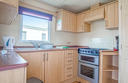 Ludchurch House | Comfortable and spacious 12ft-wide caravan with one double and two twin.