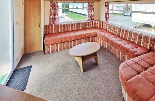 Llanllwchaiarn House | Comfortable caravan with one double and two twin.
