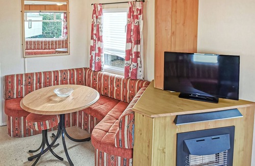 Llanllwchaiarn House | Comfortable caravan with one double and two twin.