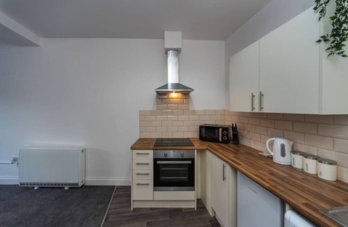 Neath Condo | Contractor Room Kitchen Central Spot