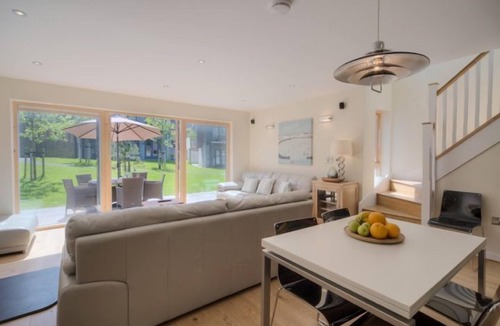 Talland House | Fabulous property with extensive roof terrace, reached by a spiral staircase, affords panoramic view