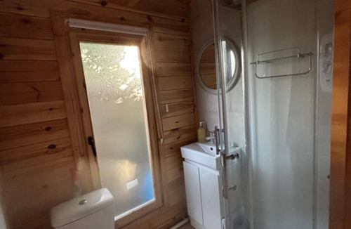 Mortimer West End Apartment | Log Cabin