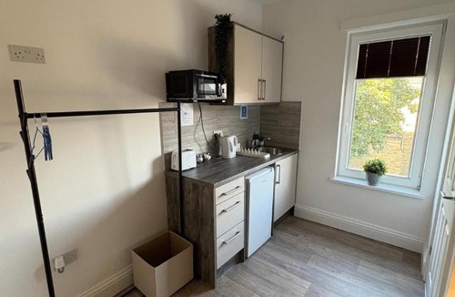 Peterborough Apartment | Modern Studio 3 with Kitchenette & Shared Kitchen