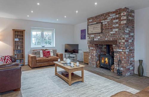Moelfre House | Pass the Keys Spacious Historic Cottage minutes from Coast