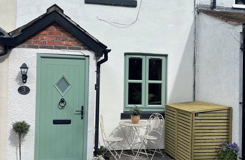 Congleton Cottage | Railway cottage, cute, cozy, peaceful, log burner, private garden, parking