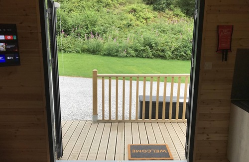 Abercwmboi Cabin | River Pod 3 (Pet Friendly) - a glamping pod that sleeps 2 guests in 1 bedroom