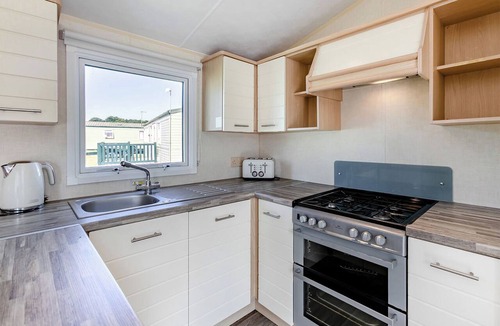 Helston House | Silver Caravan with parking