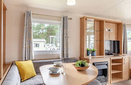 Helston House | Silver Caravan. With ensuite and decking.