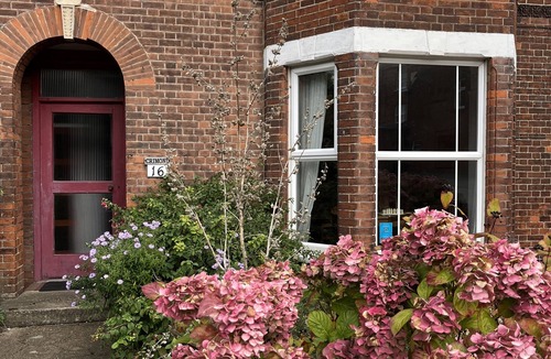Sheringham Apartment | Spacious home, moments from beach/shops. Private parking, garden. Pet friendly.