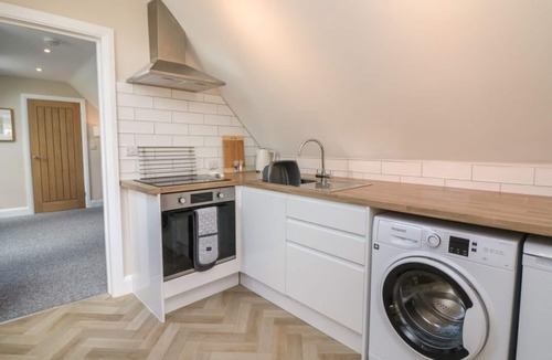 Newton Saint Cyres Apartment | Spicery Barn Loft in Devon. TV