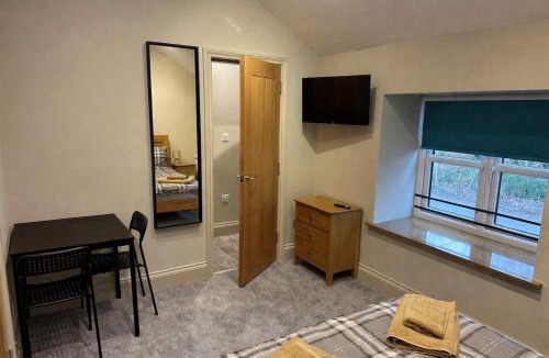 Hollow Meadows Apartment | Studio suite - Room 1