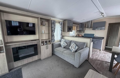 Layer Marney House | Stunning caravan at West Mersea Park with decking ref 75192WM