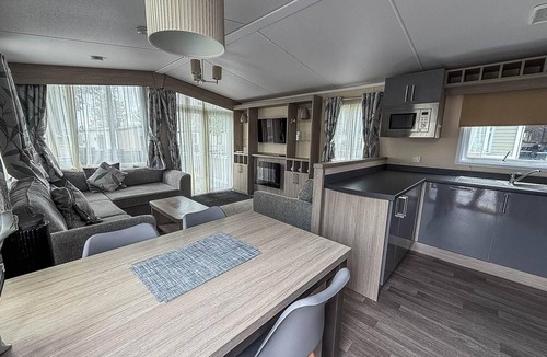 Layer Marney House | Stunning caravan at West Mersea Park with decking ref 75192WM