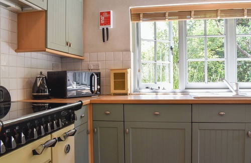 Ulwell Cottage | This charming cottage has a secluded garden which is perfect for relaxing in.