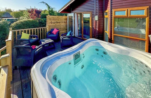 Raywell Ski Chalet | This deluxe two bedroom lodge even has its own games den.