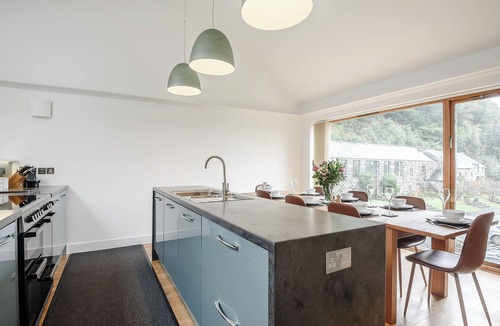Arthog Cottage | This striking home is ideally located between the beach and the hills.