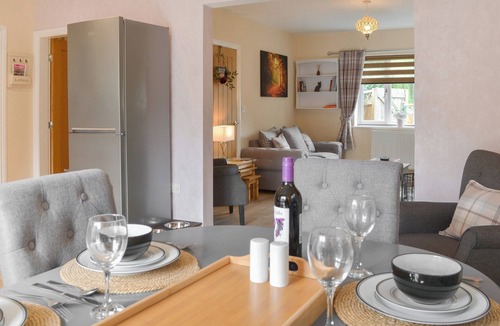 Langtoft Cottage | We love the open plan living area with wood burner.