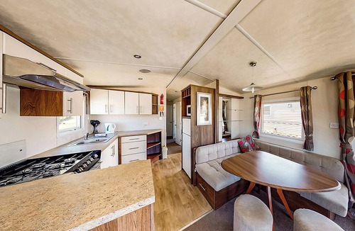 Perranporth House | Well presented 12ft-wide caravan with one double and two twin.