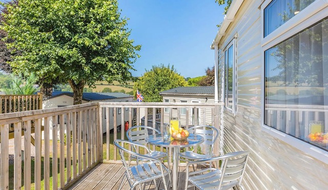Comfortable and modern 12ft-wide caravan with one double and one twin bedroom.