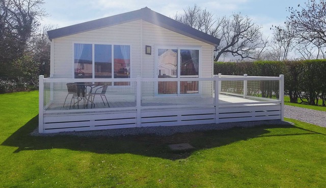 Modern and spacious holiday home with double and twin room.