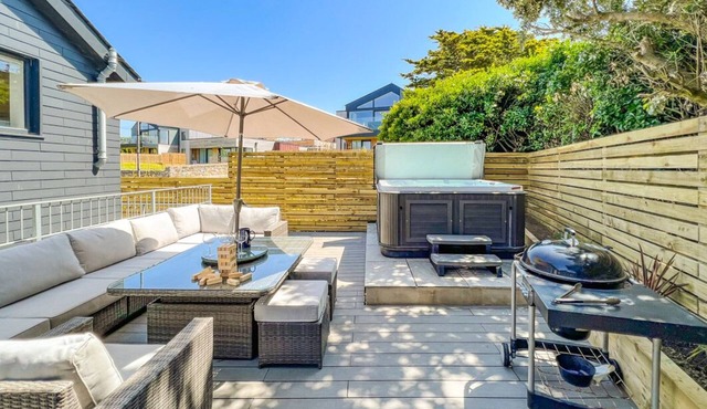 Modern Constantine Bay home with private hot tub, close to the beach and golf