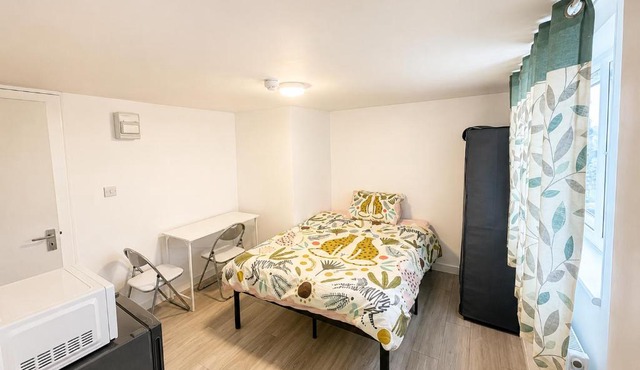 Private studio with a private bathroom and kitchenette