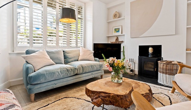 Waterside cottage with sea views & log burner